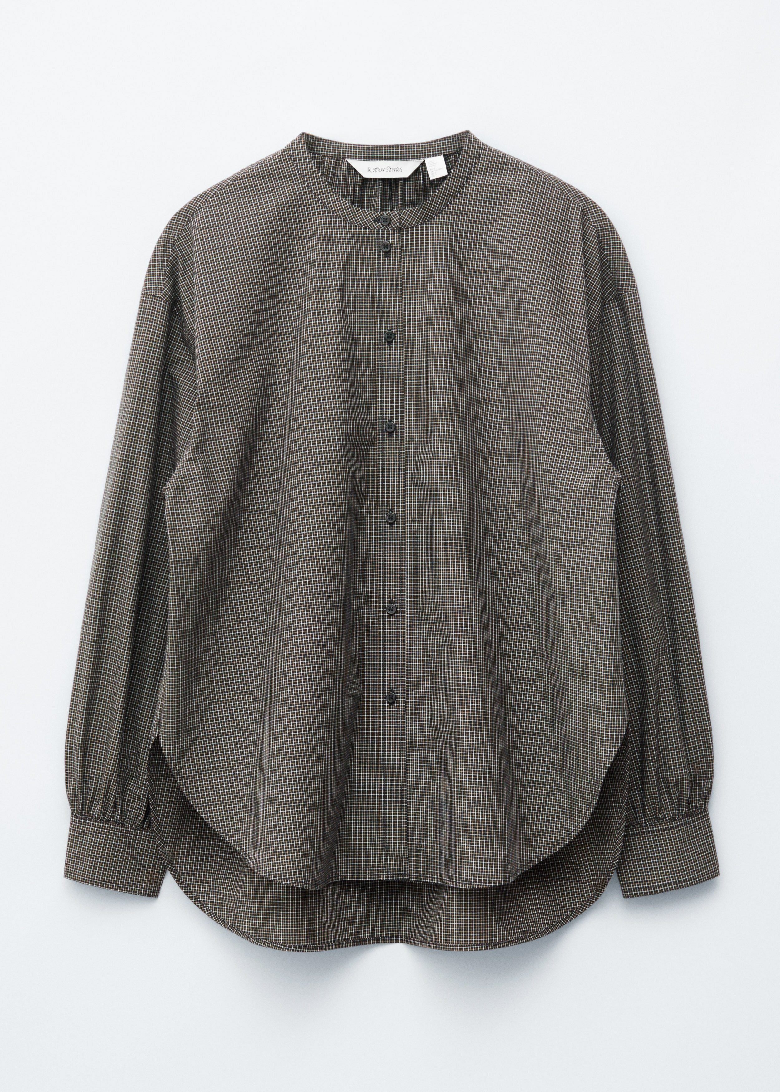 앤아더스토리즈 오버사이즈 코튼 셔츠의 블랙 체크컬러 Product입니다.