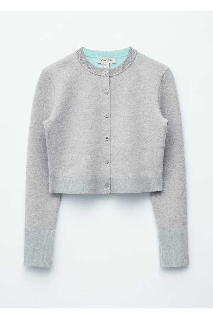 앤아더스토리즈 크롭 리버서블 가디건의 그레이/터쿼이즈컬러 Product입니다.