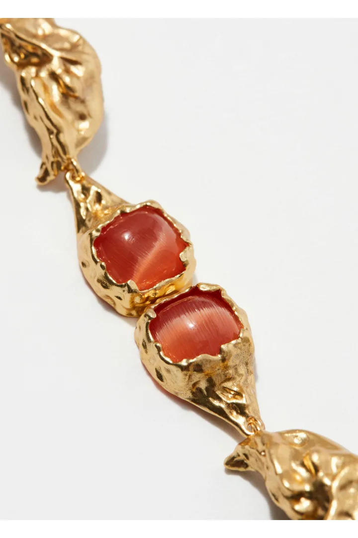 앤아더스토리즈 롱 크리스탈 이어링의 골드/오렌지컬러 Detail입니다.