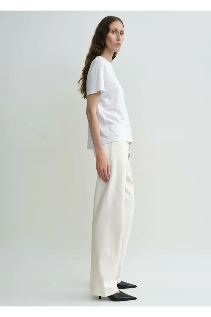 TOTEME 트위스티드 심 데님 풀 렝스 오프 화이트의 오프-화이트컬러 1번쨰 이미지입니다.