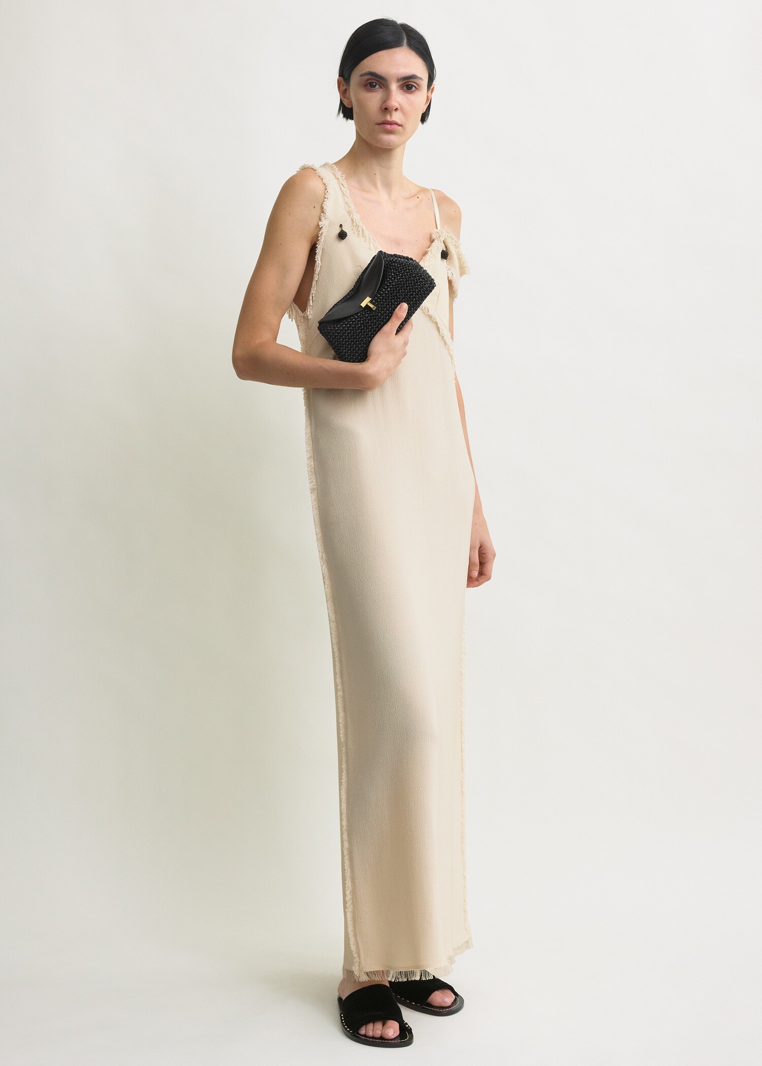 TOTEME 미니 티-락 우븐 레더 클러치 블랙의 블랙컬러 1번쨰 이미지입니다.