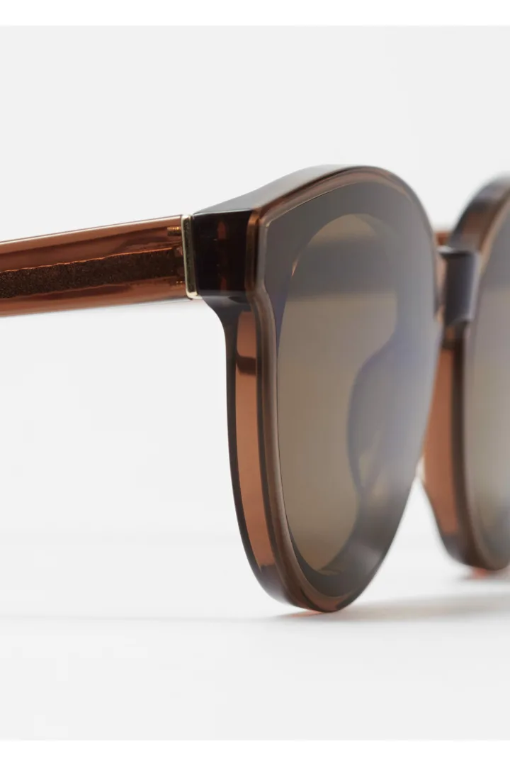 앤아더스토리즈 라운드 프레임 아세테이트 선글라스의 브라운컬러 Product입니다.