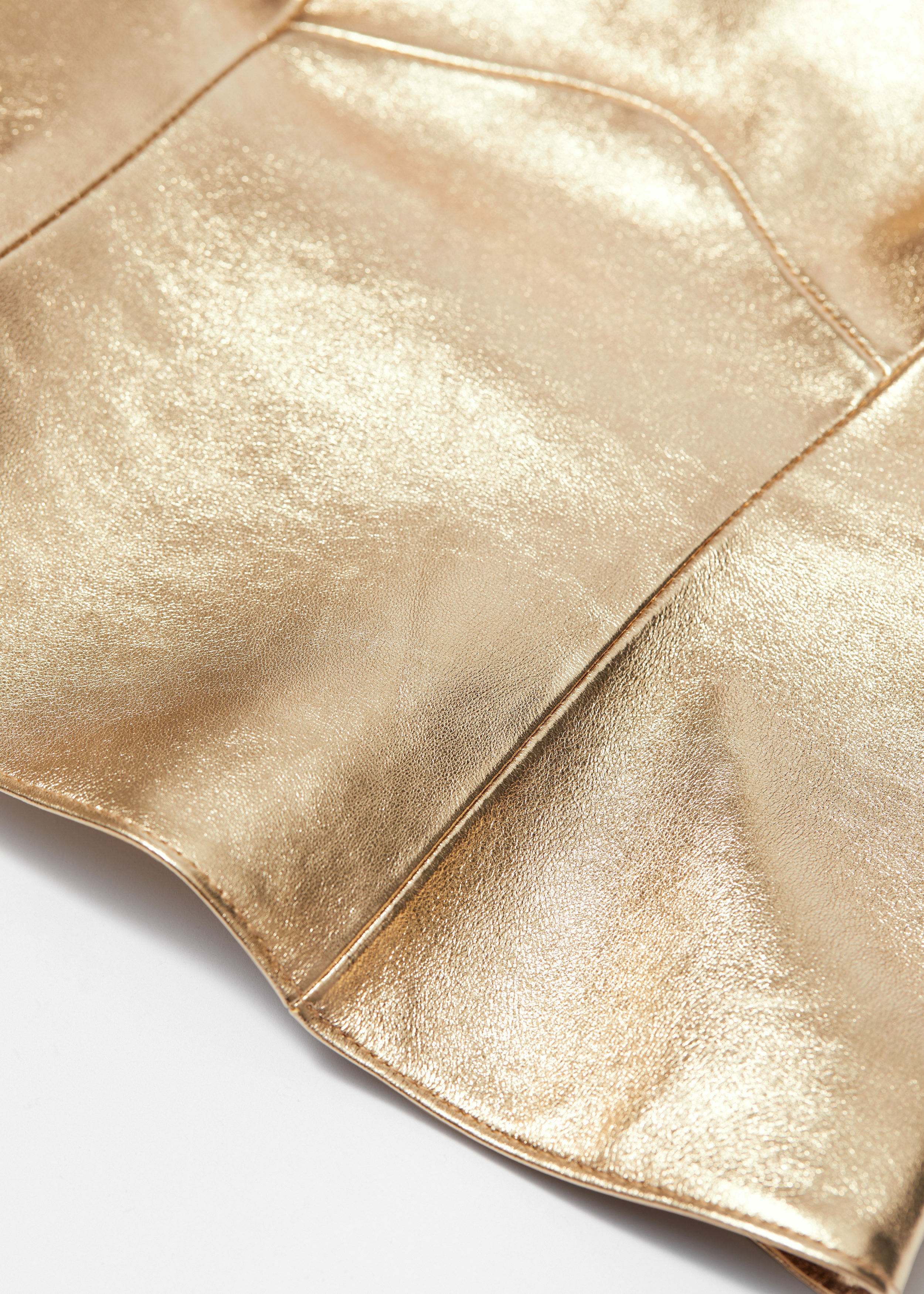 앤아더스토리즈 메탈릭 레더 뷔스티에의 골드컬러 Detail입니다.