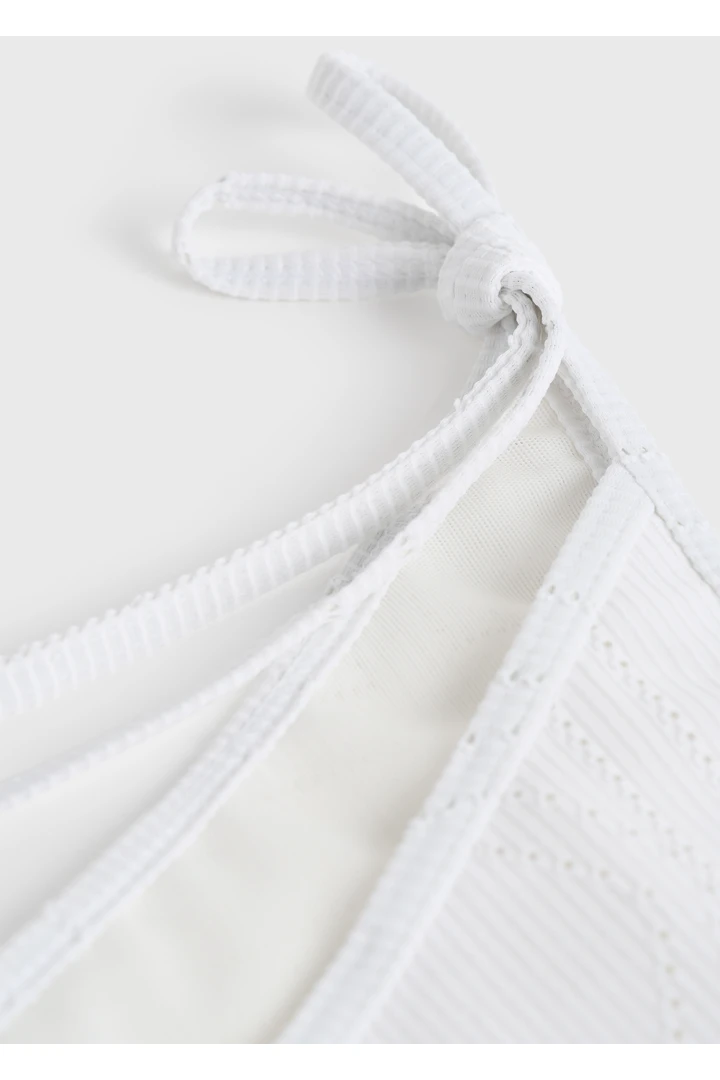 TOTEME 모노그램 포인텔 비키니 바텀 화이트의 화이트컬러 4번쨰 이미지입니다.