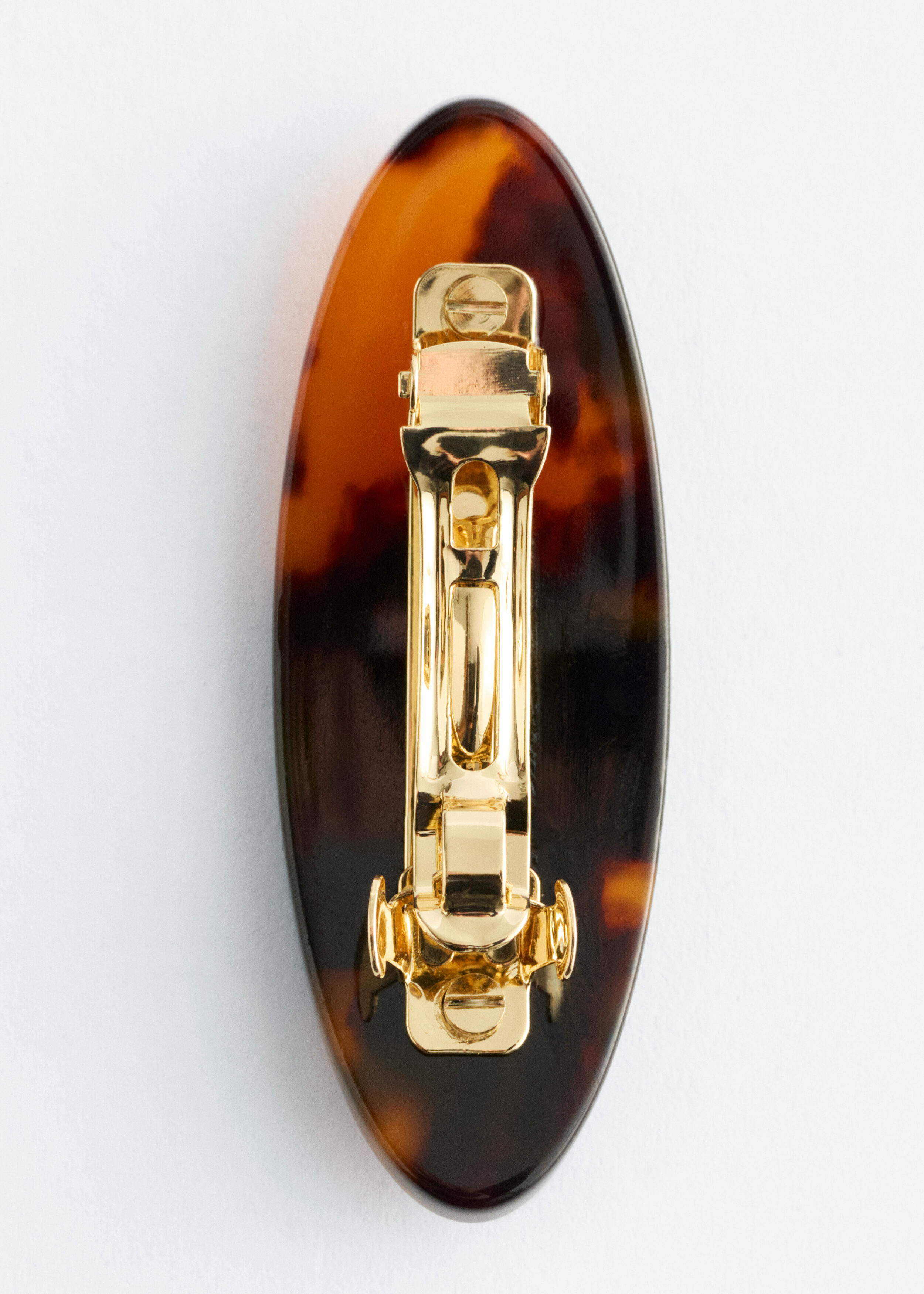 앤아더스토리즈 미니 터토이즈셸 헤어 클립의 브라운/터토이즈컬러 Product입니다.