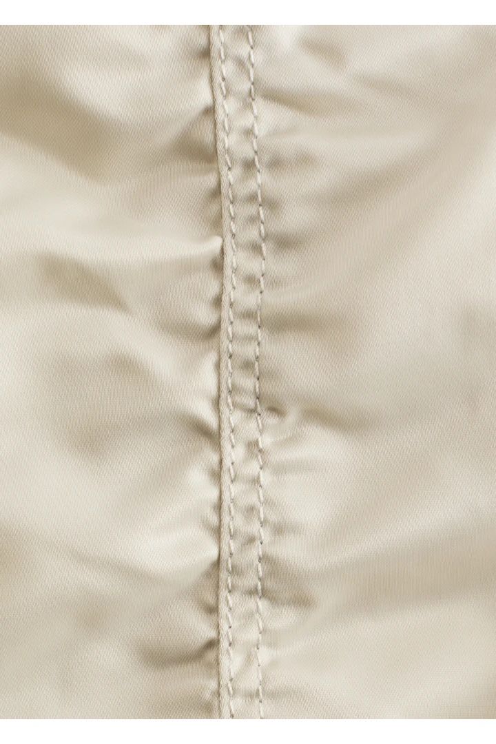 앤아더스토리즈 패디드 보머 자켓의 베이지컬러 Detail입니다.