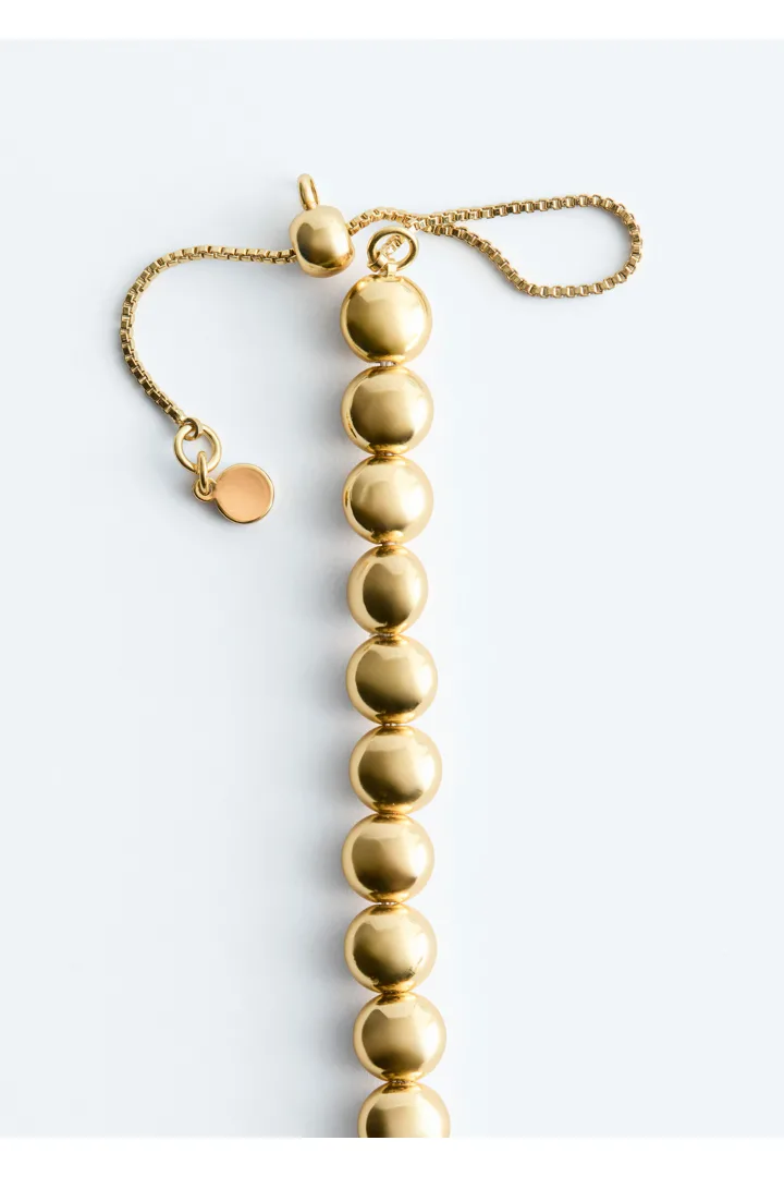 앤아더스토리즈 쇼트 비즈 네크리스의 골드컬러 Detail입니다.