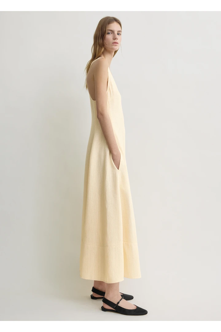 TOTEME 스컬프티드 코튼 드레스 에크루의 에크루컬러 1번쨰 이미지입니다.