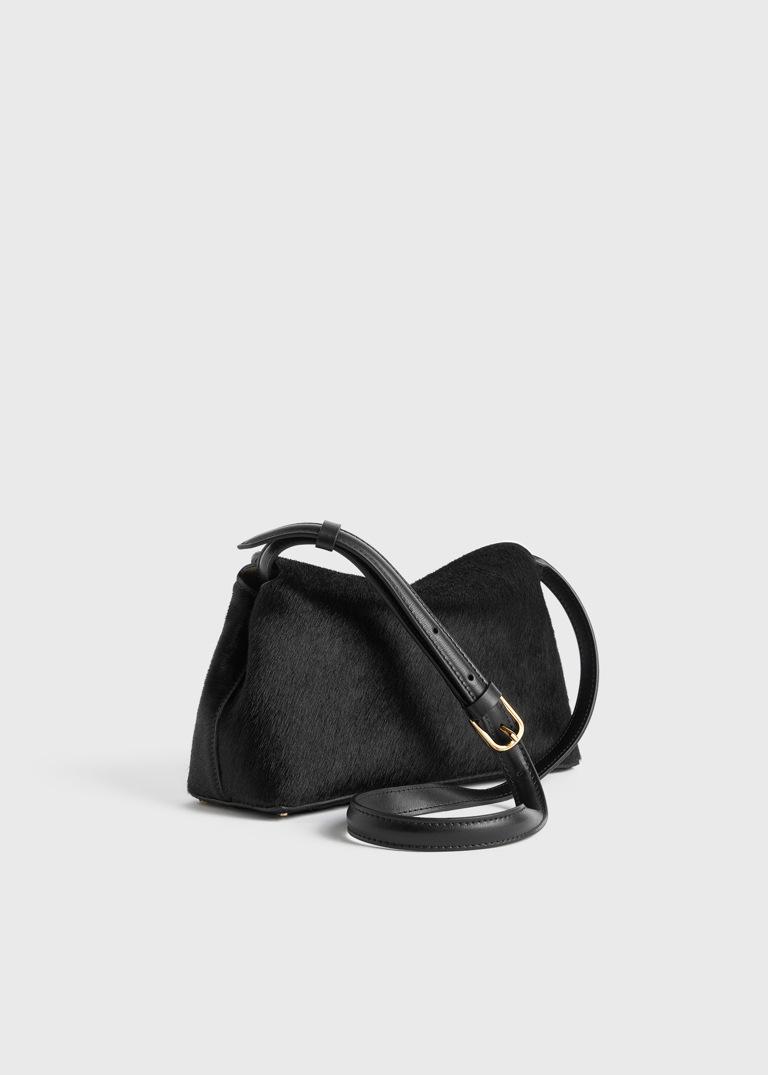 TOTEME 티-락 포니 헤어 클러치 블랙의 블랙컬러 7번쨰 이미지입니다.