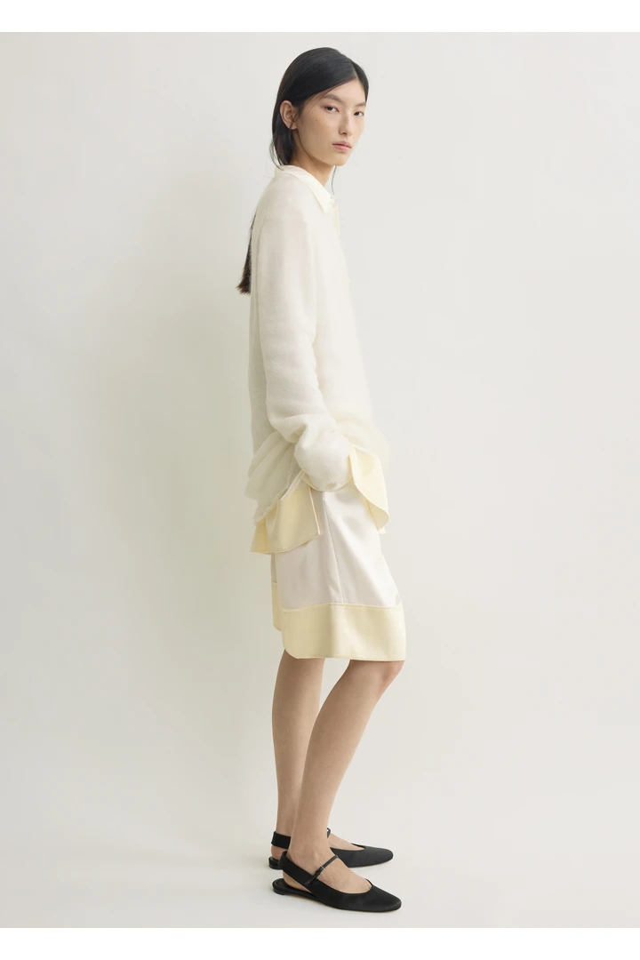 TOTEME 롱 오픈 위브 니트 오프 화이트의 오프 화이트컬러 1번쨰 이미지입니다.