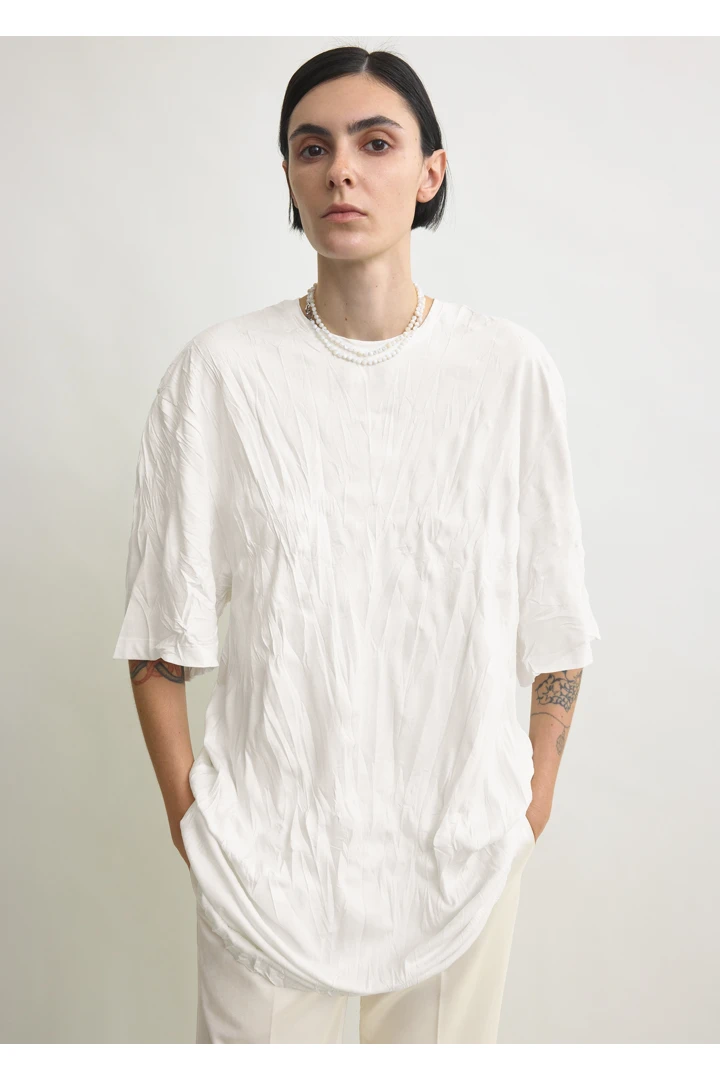 TOTEME 릴랙스드 티 드레스 오프 화이트의 오프 화이트컬러 3번쨰 이미지입니다.