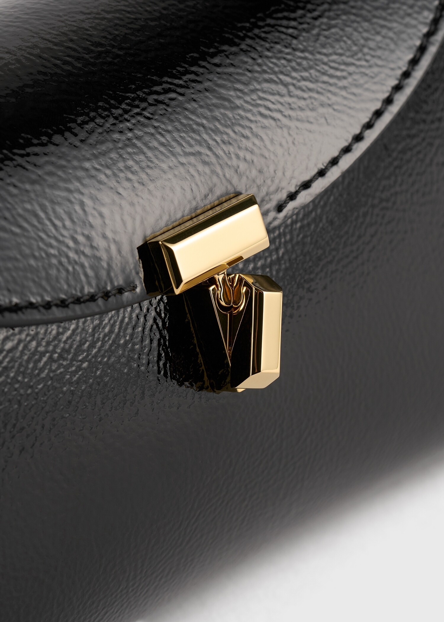 TOTEME 미니 티-락 나플락 클러치 블랙의 블랙컬러 5번쨰 이미지입니다.