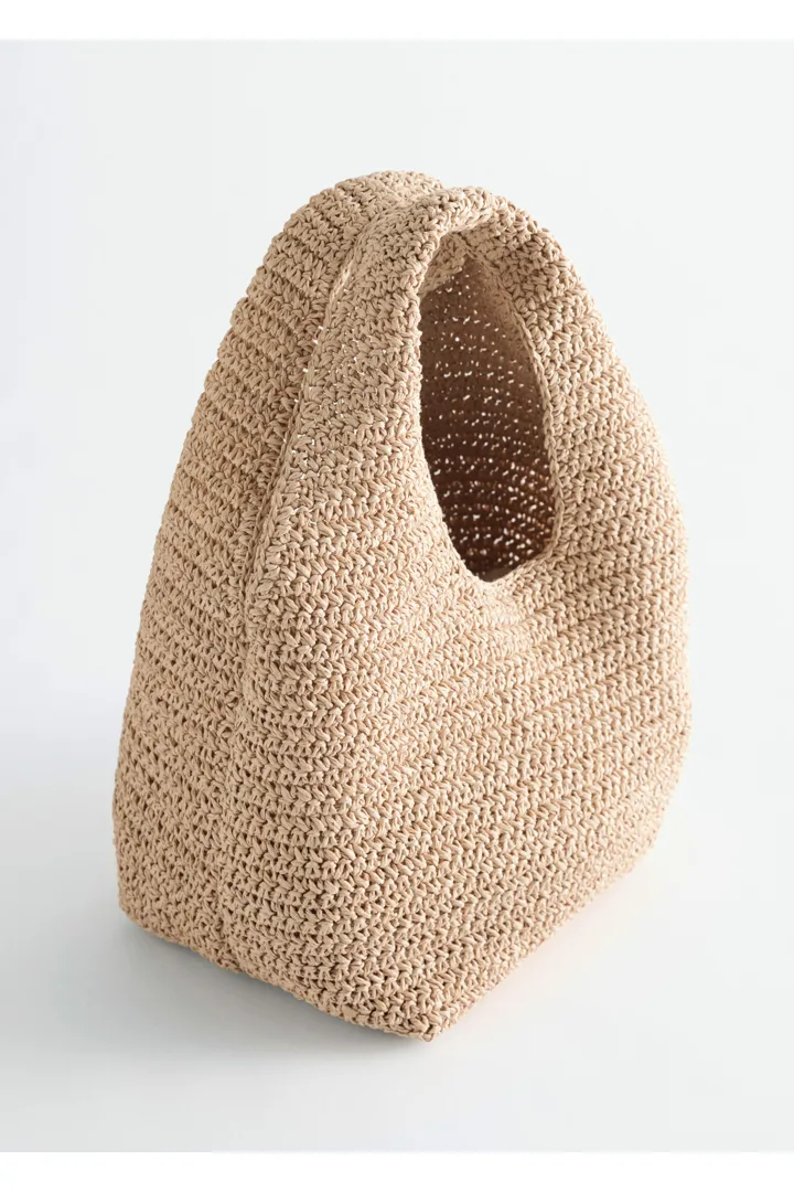 앤아더스토리즈 페이퍼 스트로 미니 토트의 베이지컬러 Product입니다.