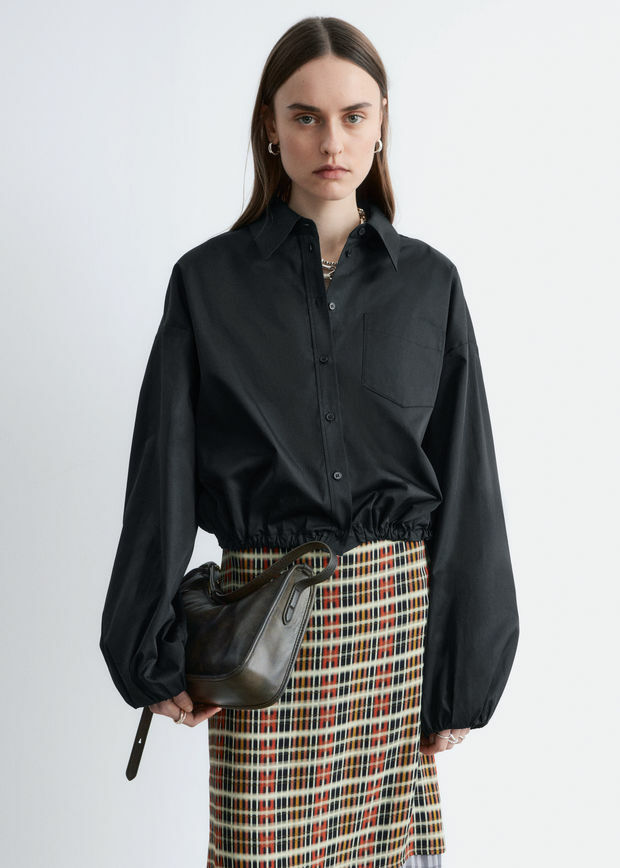 앤아더스토리즈 니 렝스 슬립 스커트의 오렌지-체크컬러 ECOMLook입니다.