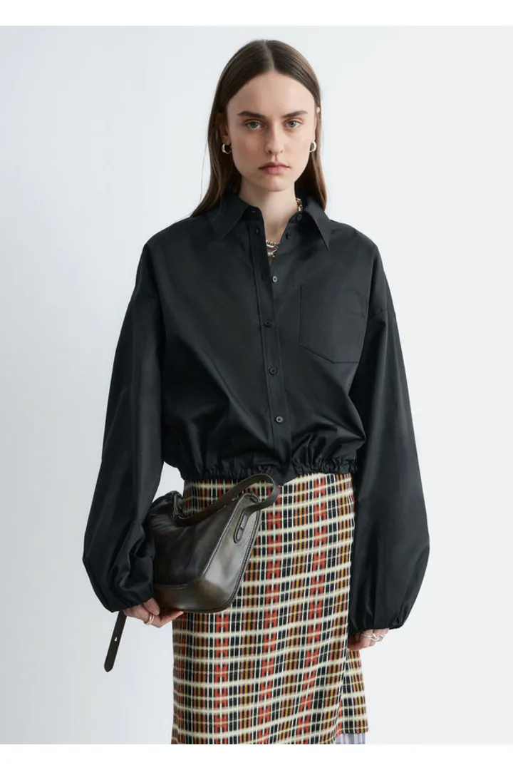 앤아더스토리즈 니 렝스 슬립 스커트의 오렌지-체크컬러 ECOMLook입니다.