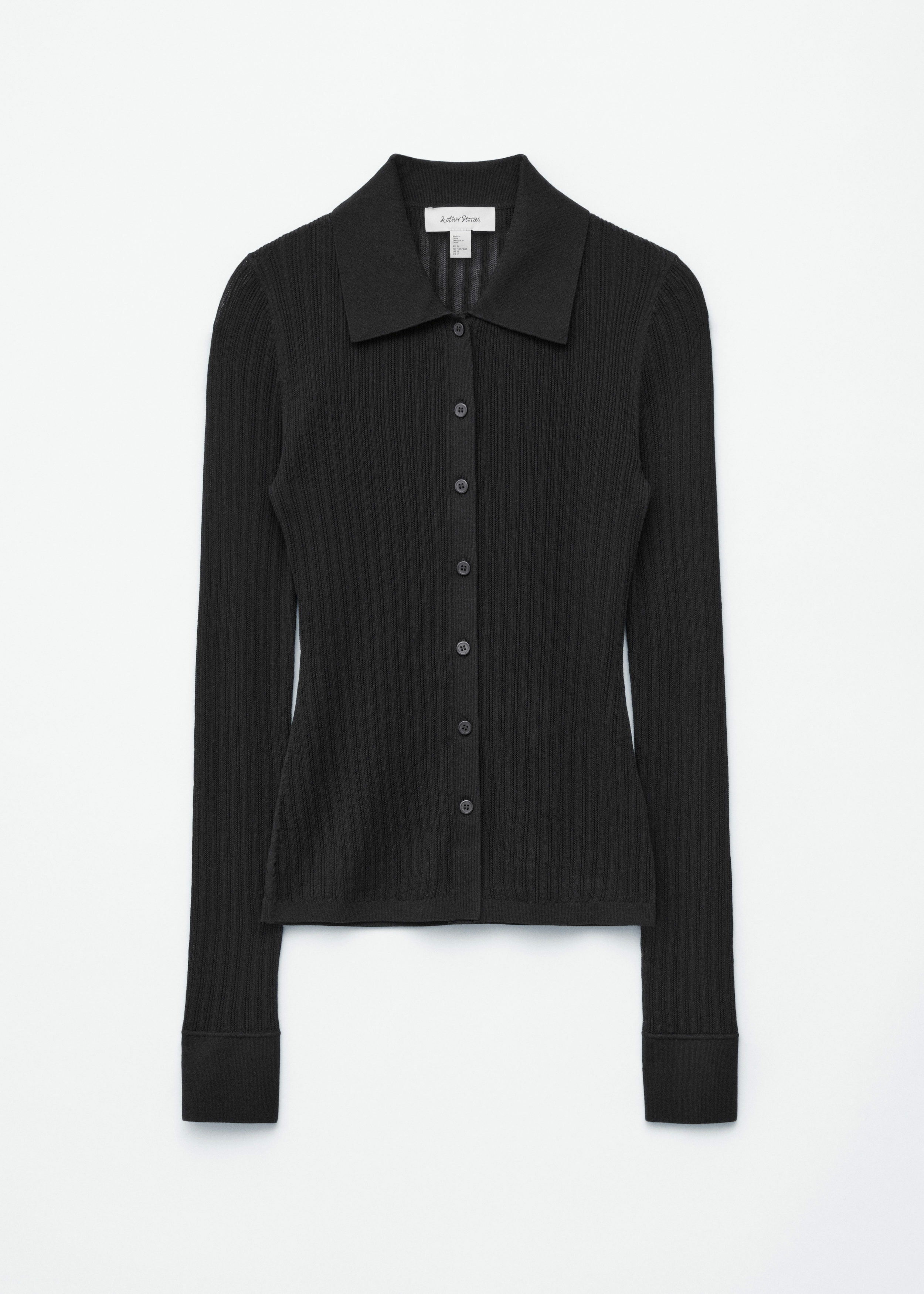 앤아더스토리즈 포인텔 립 폴로 셔츠의 블랙컬러 Product입니다.