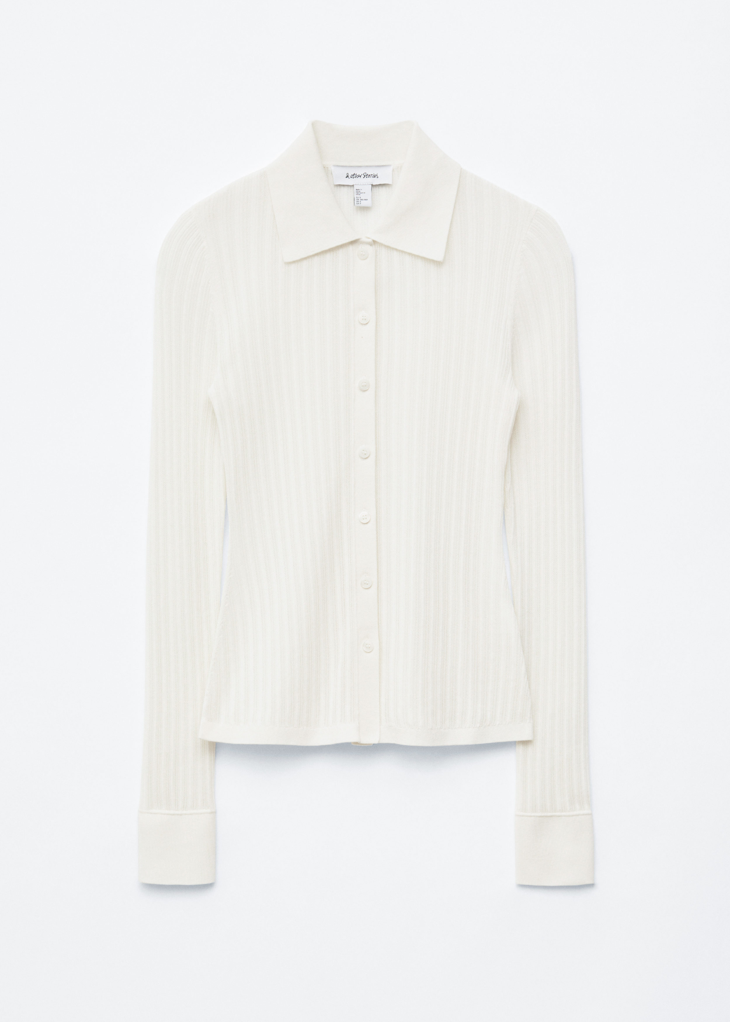 앤아더스토리즈 포인텔 립 폴로 셔츠의 화이트컬러 Product입니다.