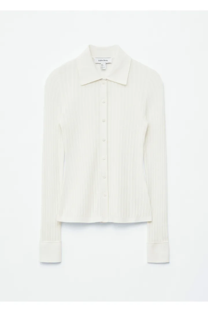 앤아더스토리즈 포인텔 립 폴로 셔츠의 화이트컬러 Product입니다.