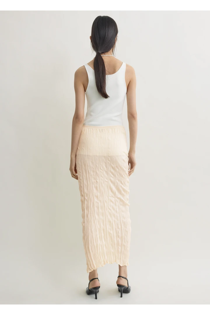 TOTEME 크링클드 니트 스커트 페일 에이프리컷의 페일 에이프리컷컬러 2번쨰 이미지입니다.