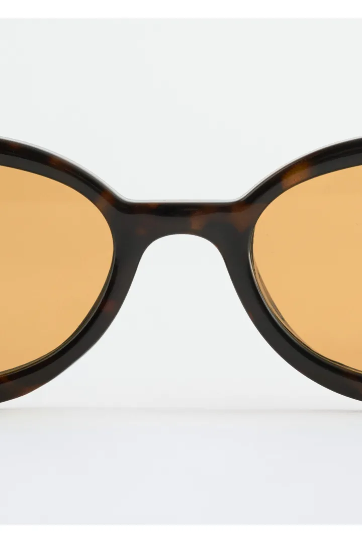 앤아더스토리즈 슬림 오벌 프레임 선글라스의 브라운/터토이즈컬러 Product입니다.