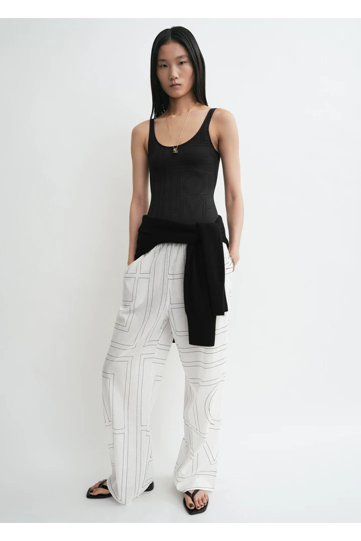 TOTEME 모노그램 코튼 PJ 바텀즈 화이트/블랙의 화이트/블랙컬러 0번쨰 이미지입니다.