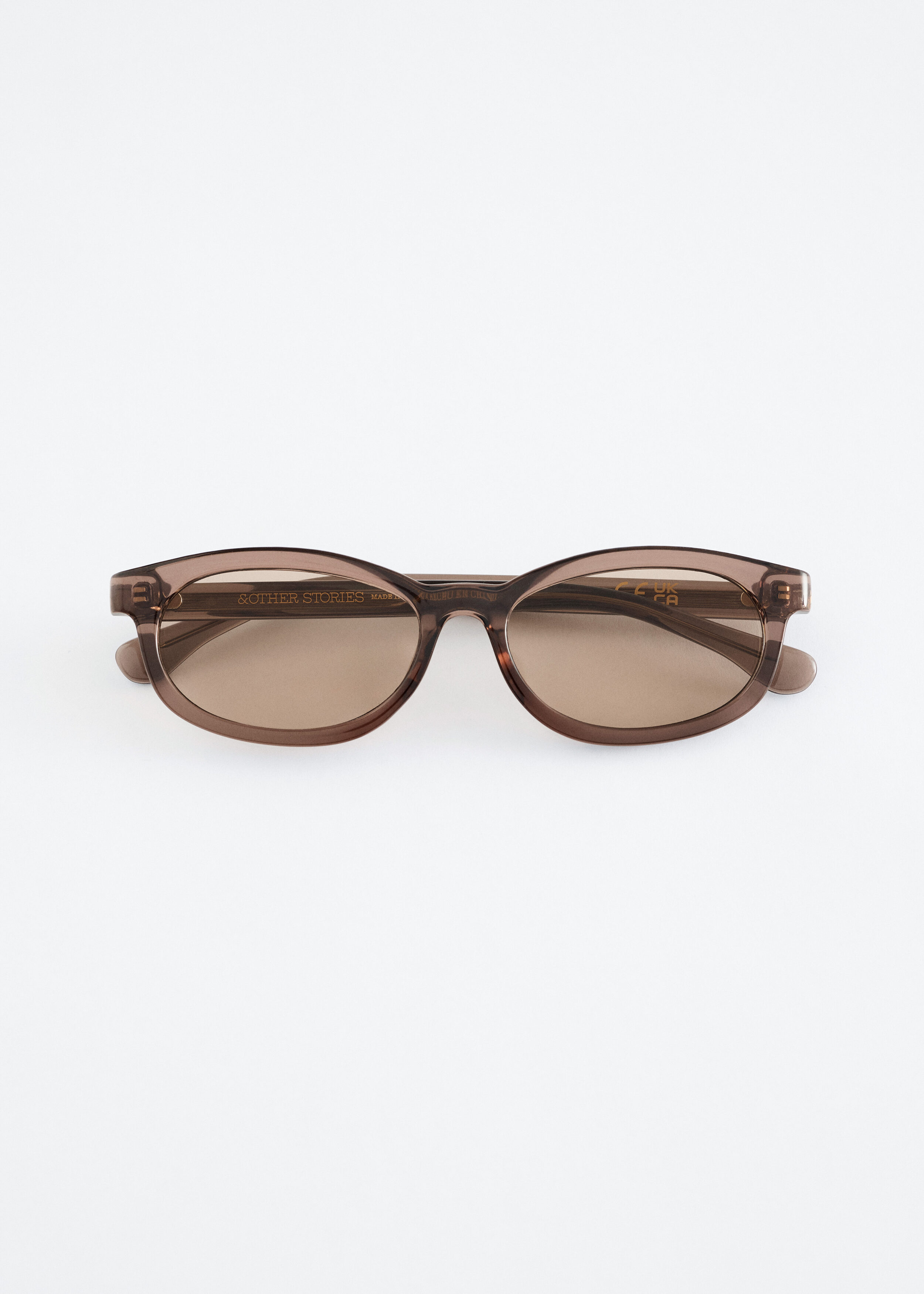 앤아더스토리즈 내로우 렉탱글 선글라스의 스톤컬러 Product입니다.