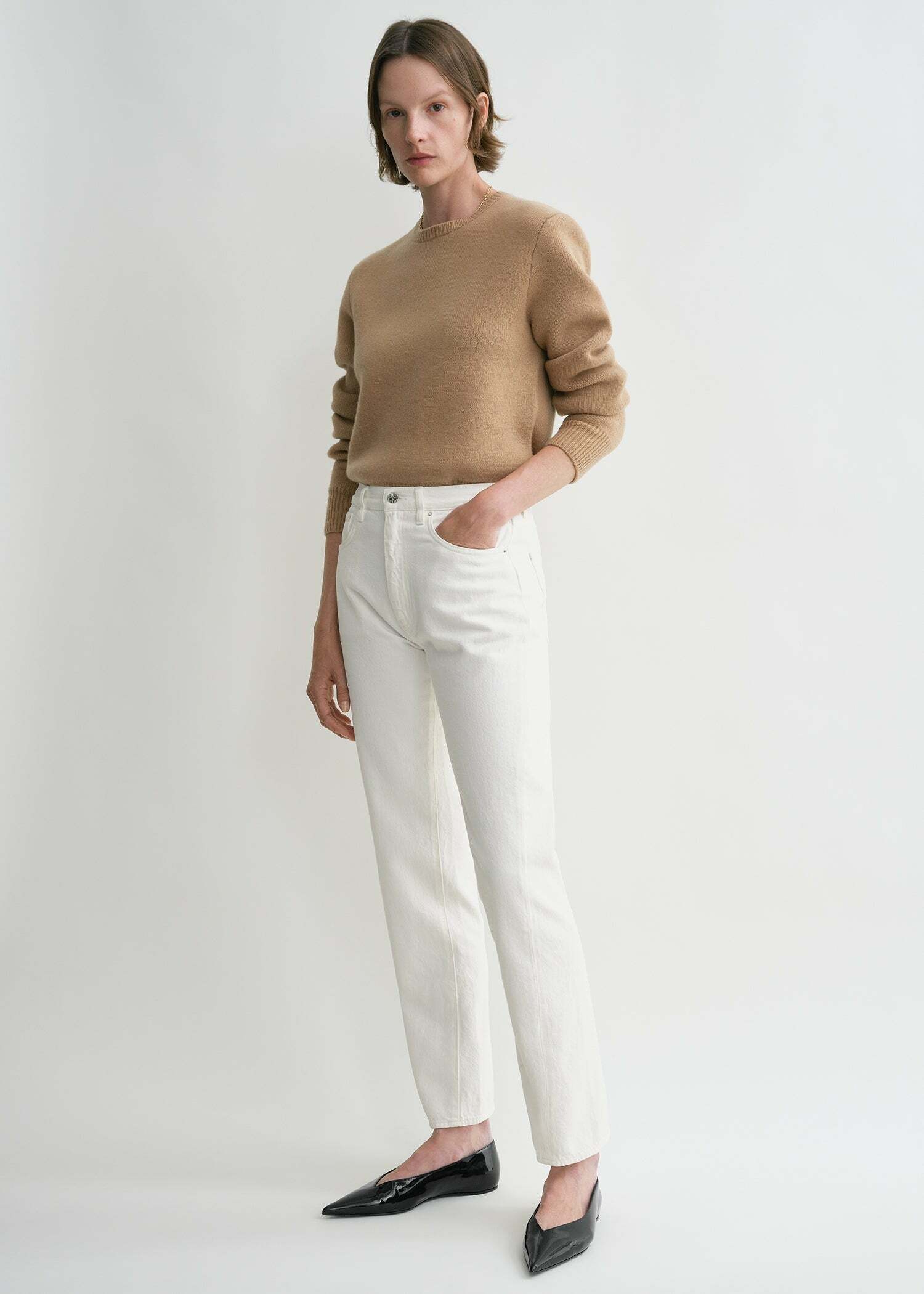 TOTEME 트위스티드 심 데님 오프 화이트의 오프-화이트컬러 0번쨰 이미지입니다.