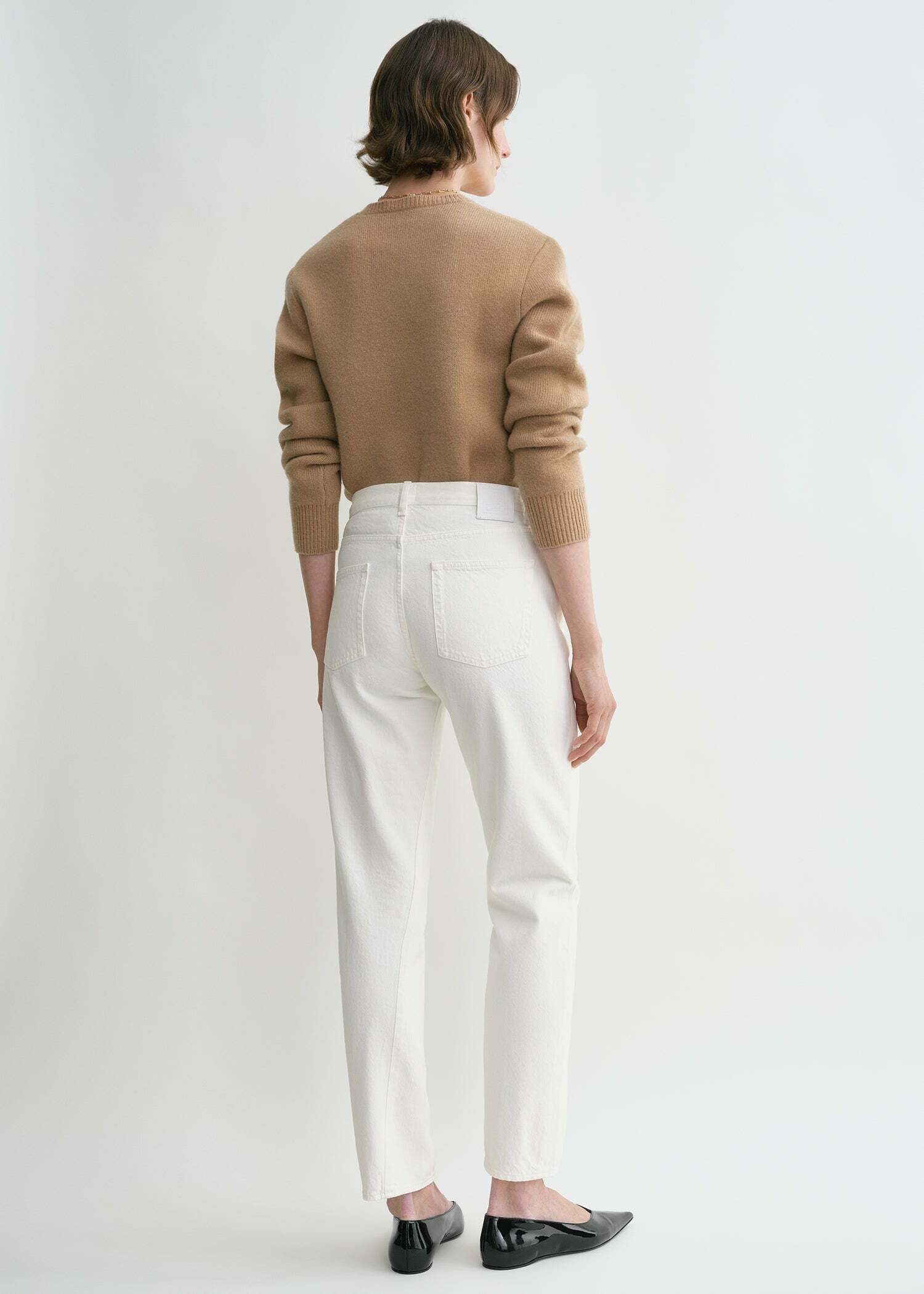 TOTEME 트위스티드 심 데님 오프 화이트의 오프-화이트컬러 2번쨰 이미지입니다.