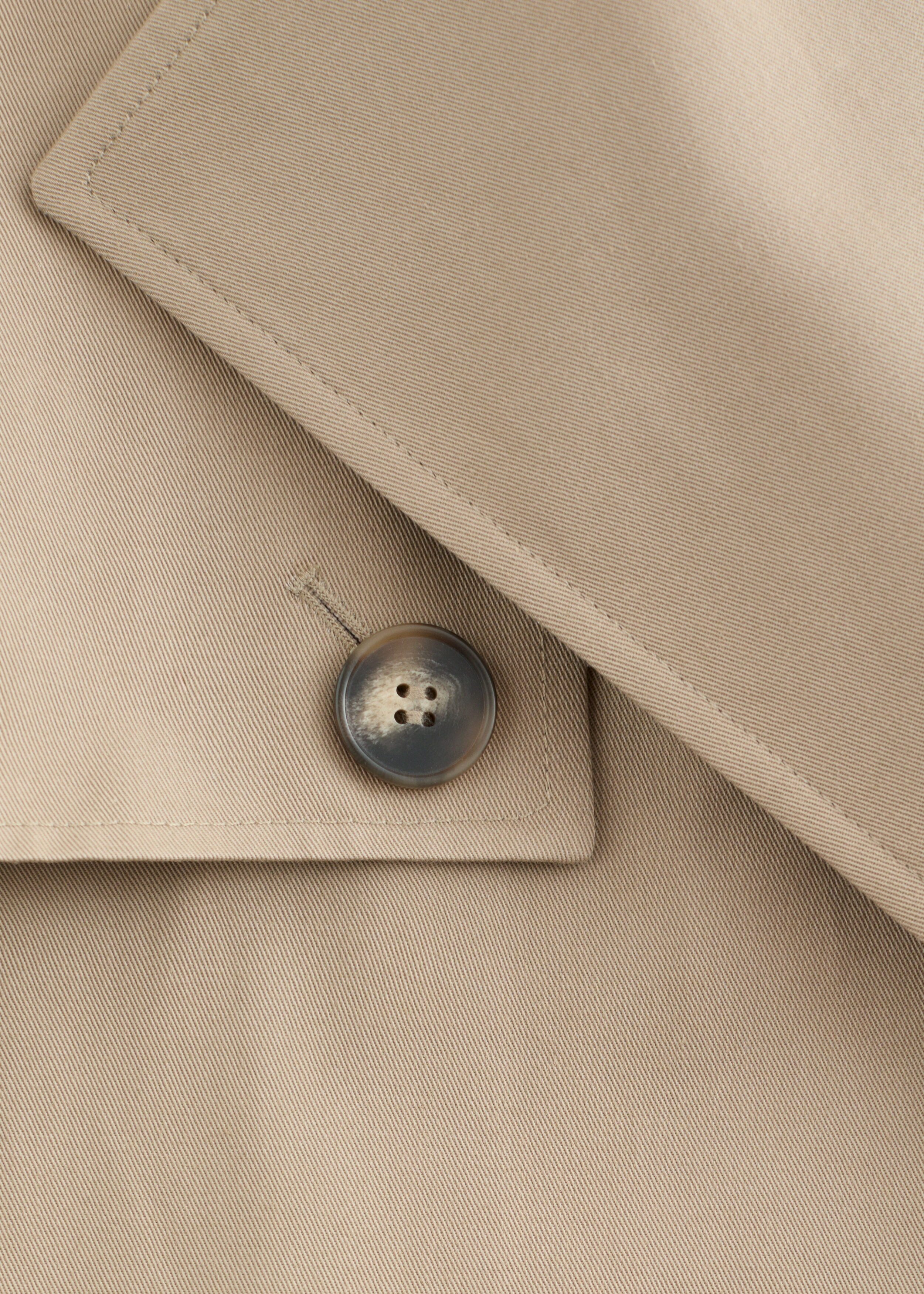 앤아더스토리즈 더블 브레스티드 트렌치 코트의 베이지컬러 Detail입니다.