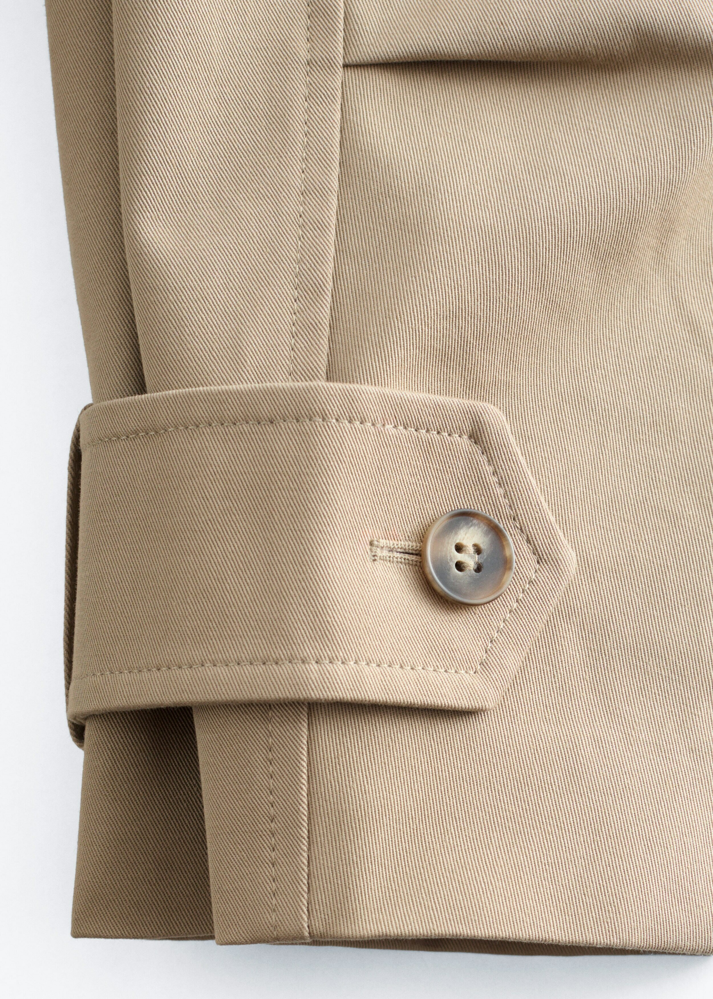 앤아더스토리즈 더블 브레스티드 트렌치 코트의 베이지컬러 Detail입니다.